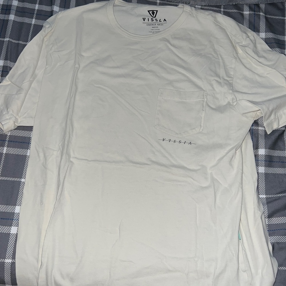 Vissla t shirt with surfboard on car featured on the back of the shirt